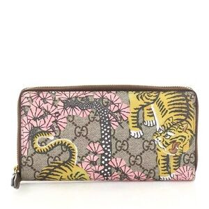 Sold! Gucci NWOT bengal tiger supreme floral zipper wallet with brown interior